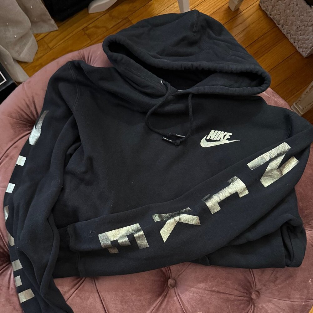 NIKE- BLACK PULL OVER HOODIE- METALLIC LOGO ARMS